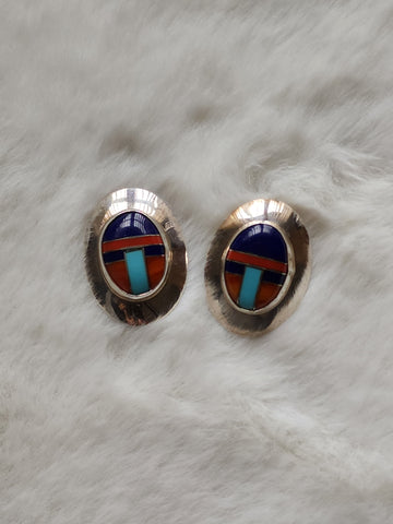 Navajo Sterling Silver w/ Multi Stone Inlay 1in Earrings     (Vintage) Artist:  unsigned  Excellent vintage condition, very light patina.  Inlaid Turquoise, Lapis, Red Coral and Spiny Oyster Turquoise.  Inlay work is in mint condition!  Beautiful earrings. 