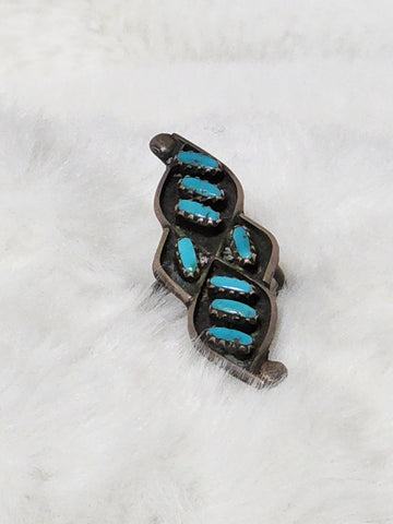 Zuni Petit Point Turquoise Ring    Size 6    (Vintage)Artist:  Unsigned  Handmade ring, made between 1930 -1940's  Ring is in excellent condition, no loose stones.  Heavy patina.